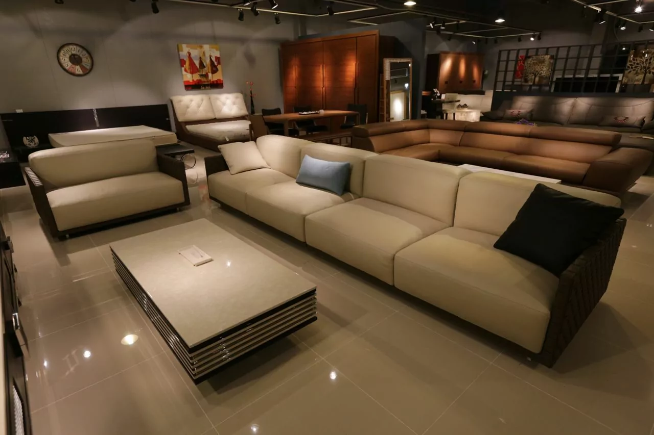 Furniture showroom with sofas and wooden cabinetry