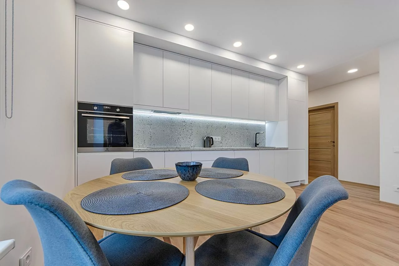 Wooden tables for dining and living spaces
